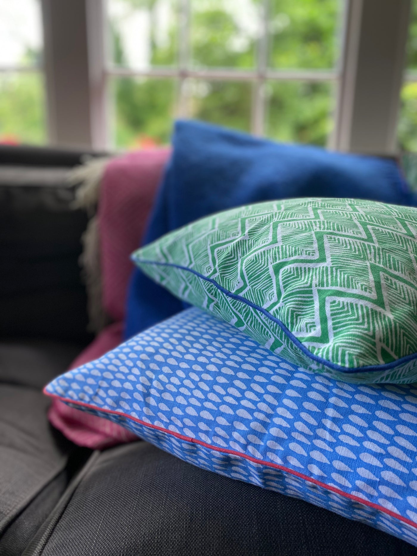 Kitty-Holmes-square-mid-blue-cushion-cover-with-white-drops-and-green-zigzag-print-colourful-cushion